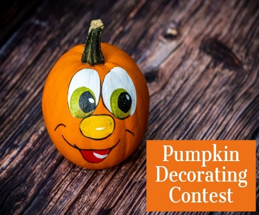 Small pumpkin decorated with a smiling face next to text that says Pumpkin Decorating Contest